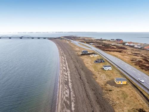 an aerial view of a road next to a body of water at Holiday Home Nyalle - 50m to the inlet by Interhome in Struer