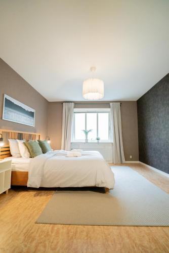 Ένα ή περισσότερα κρεβάτια σε δωμάτιο στο Large City-Centre Apartment