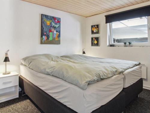 Katil atau katil-katil dalam bilik di Holiday Home Solvejg - 30km from the sea by Interhome