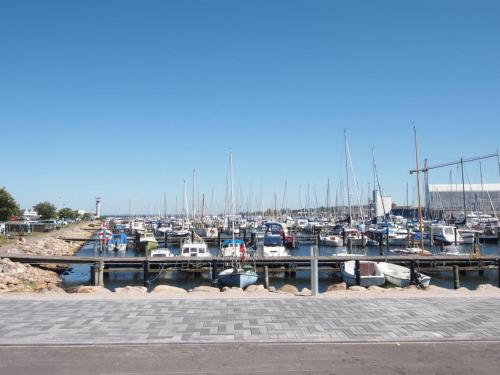 a marina filled with lots of boats on the water at Holiday Home Claudine - 90m from the sea by Interhome in Assens