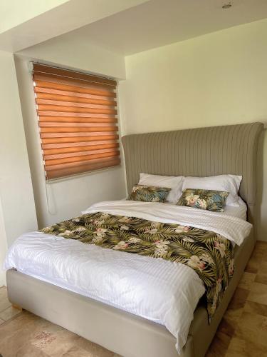 Ένα ή περισσότερα κρεβάτια σε δωμάτιο στο CC Beach villa in wailoaloa