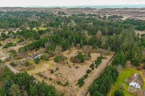 an aerial view of a farm with trees at 10173-Ulfborg-Gaffelbjergvej-24 in Øhuse