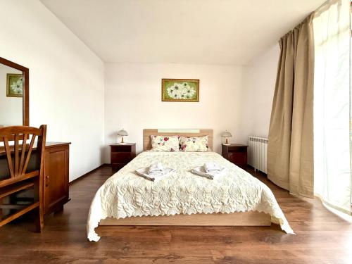 Postel nebo postele na pokoji v ubytování Family Hotel Carpe Diem