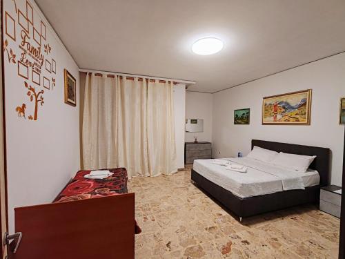 Postel nebo postele na pokoji v ubytování Tarak palace Inn