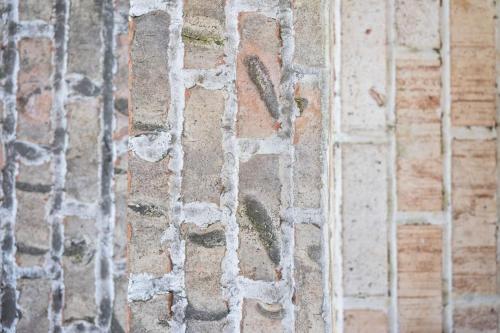a close up of a brick wall at The Pink and Old Clarksville House - Alpha Link Homes in Clarksville