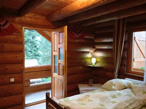 Ένα ή περισσότερα κρεβάτια σε δωμάτιο στο Casa Panaghia