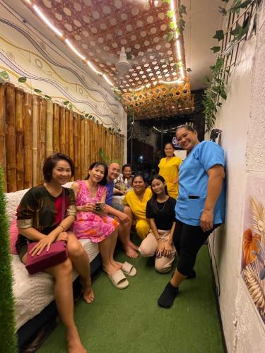 a group of people sitting in a room at Massaji&SPA-Massage Spa in Oslob
