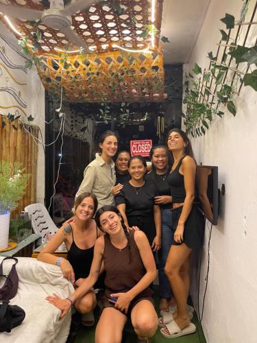 a group of women posing for a picture in a room at Massaji&SPA-Massage Spa in Oslob