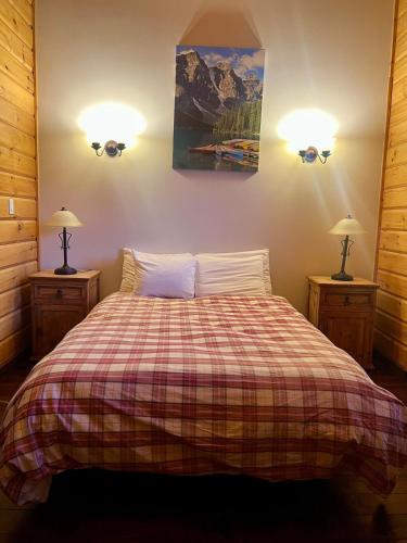 Postel nebo postele na pokoji v ubytování Chalets Gallix