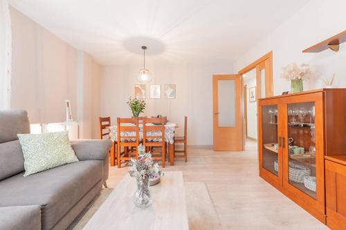 a living room with a couch and a table at Apartamento Aires del Jiloca en Cella in Cella
