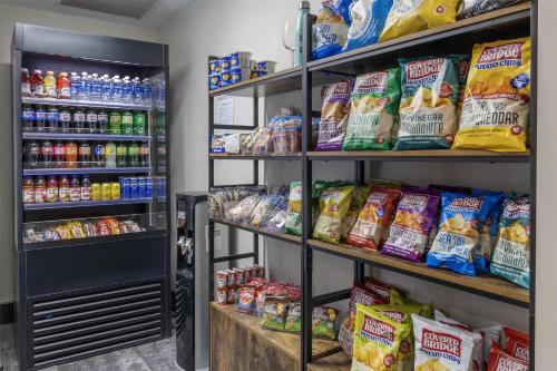 a store aisle with shelves of food and drinks at Best Western Plus Chocolate Lake Hotel - Halifax in Halifax
