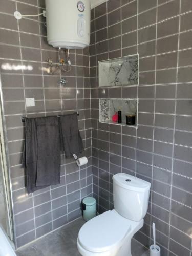 A bathroom at Ghanastays