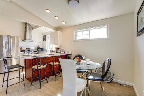 a kitchen with a table and chairs in a kitchen at Walk to Dimond District Gems Home in Oakland in Oakland