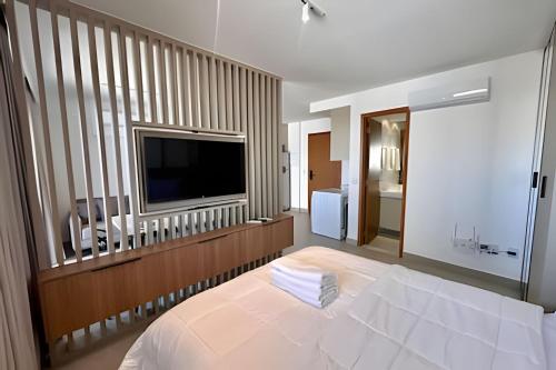 Ένα ή περισσότερα κρεβάτια σε δωμάτιο στο Suíte Clean Premium By Boss