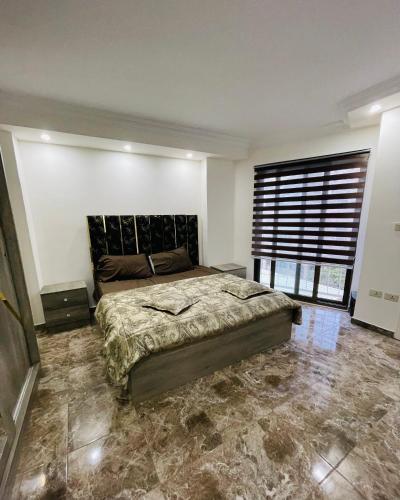 Ένα ή περισσότερα κρεβάτια σε δωμάτιο στο Newly built studio in the most beautiful areas of Jabal Amman استوديو بناء جديد في اجمل مناطق جبل عمان