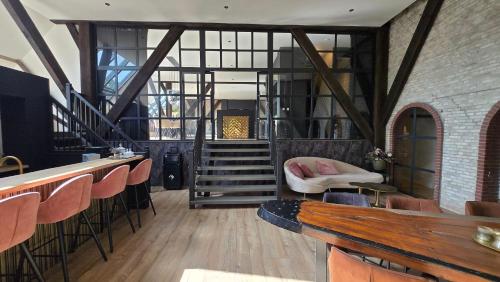 Χώρος καθιστικού στο Gehele woning in Herbaijum
