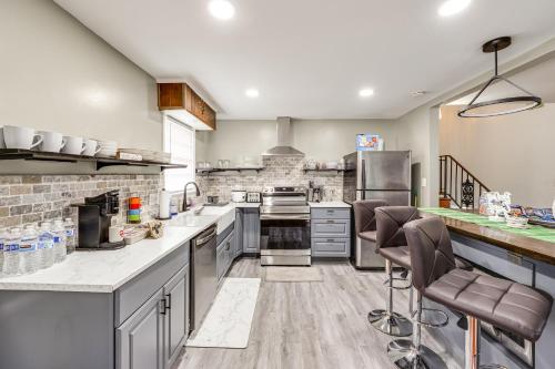 a large kitchen with stainless steel appliances and counters at Alexandria, Mt Vernon Home by Hikes, Bikes and Sites in Newton Woods