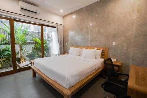 Ένα ή περισσότερα κρεβάτια σε δωμάτιο στο Suksma Guesthouse