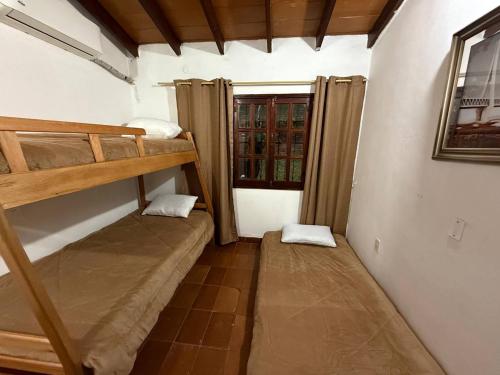 Una cama o camas en una habitación de La Casa Siberia