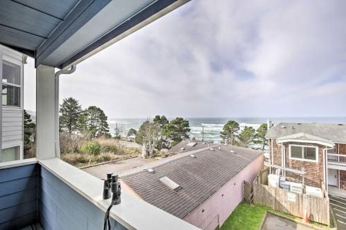 a view from the balcony of a house at The Moby House Coastal Retreat with Ocean Views & Hot Tub in Depoe Bay