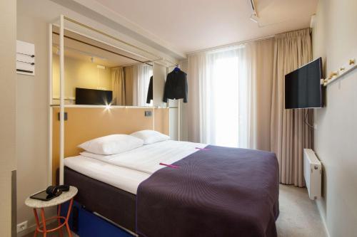 Cama o camas de una habitación en Scandic Grensen