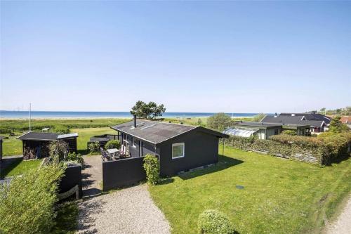 スラーエルセにあるSL203-Slagelse-Strandvaenget-46の海を背景にした家屋の空見