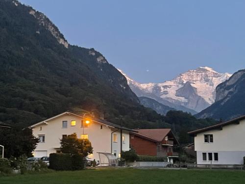 a house with a view of a mountain at S&P Mountain View Apartment 2 in Wilderswil