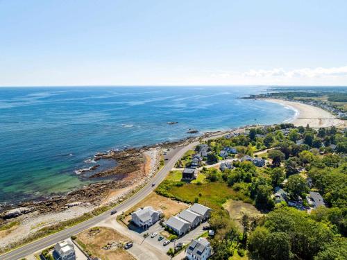 an aerial view of a beach and the ocean at Coastal Bliss in Rye