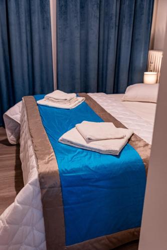 Katil atau katil-katil dalam bilik di Florence Rooms Novella