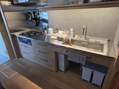 Kuchyň nebo kuchyňský kout v ubytování YohakuINN-johacu - Vacation STAY 19254