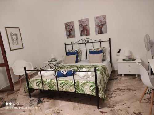 Кровать или кровати в номере La Maison