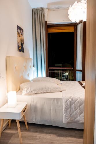 Katil atau katil-katil dalam bilik di Florence Rooms Novella