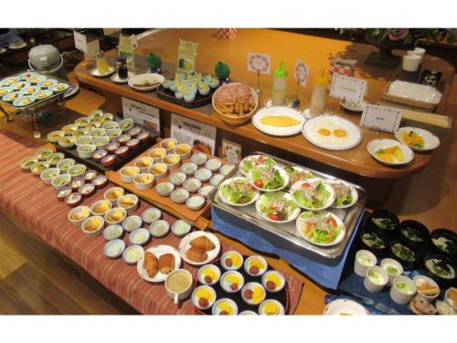 a buffet with many different types of food on display at Smile Hotel Tokushima - Vacation STAY 10493v in Tokushima
