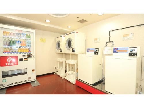 a room with two machines and two stools at Smile Hotel Tokushima - Vacation STAY 10491v in Tokushima