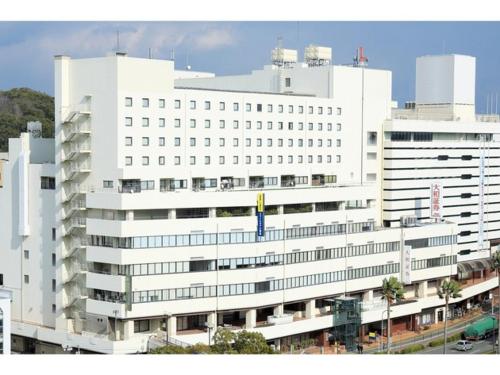 a large white building with a lot of windows at Smile Hotel Tokushima - Vacation STAY 10502v in Tokushima