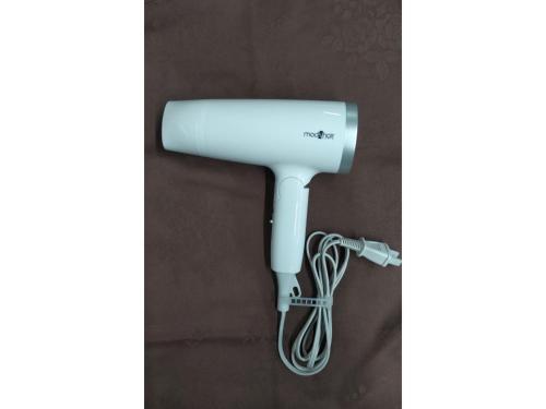 a white hair dryer hanging on a wall at Smile Hotel Shimonoseki - Vacation STAY 12586v in Shimonoseki