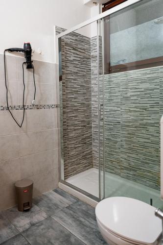 Bilik mandi di Florence Rooms Novella