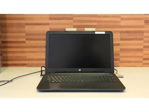 a black laptop computer sitting on top of a table at Smile Hotel Shimonoseki - Vacation STAY 12504v in Shimonoseki