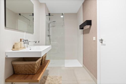 a bathroom with a sink and a shower at Evergreen Exclusive in Mijas Costa
