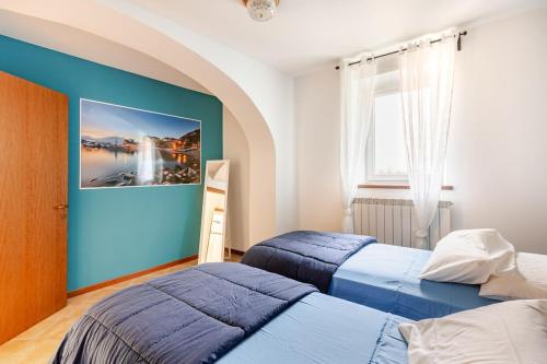 En eller flere senge i et værelse på La Casa Del Sole