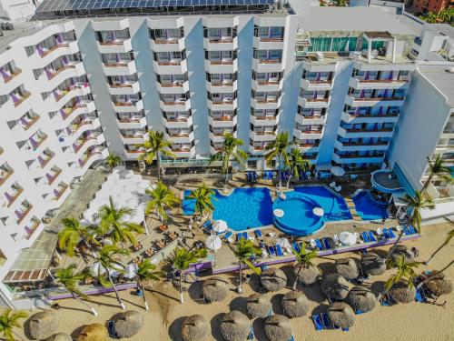 an aerial view of a resort with a pool at Oceano Palace in Mazatlán
