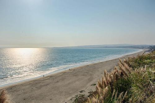 a view of a beach and the ocean at South Bluff Beauty Ocean Views Galore 2 Bedroom in La Selva Beach