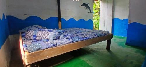 Postel nebo postele na pokoji v ubytování Hostal el peñón