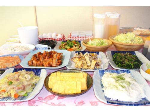 a table topped with lots of different types of food at Smile Hotel Towada - Vacation STAY 06152v in Towada