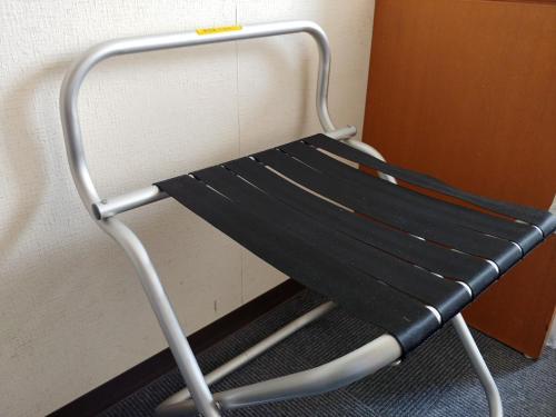 a metal bench sitting next to a wall at Smile Hotel Towada - Vacation STAY 06152v in Towada