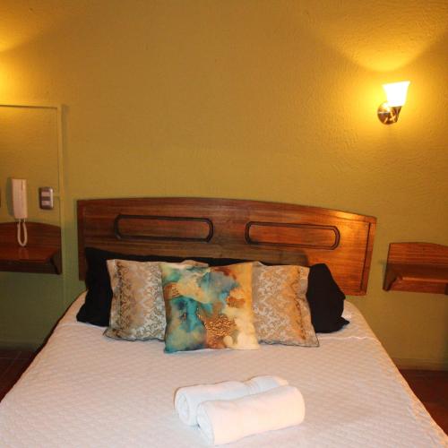 Кровать или кровати в номере Motel Ruta M Habitación Economy