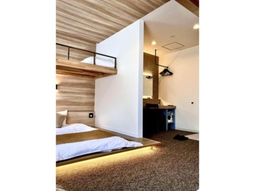Кровать или кровати в номере K,M,H Art hotel by Kure Morisawa - Vacation STAY 23294v