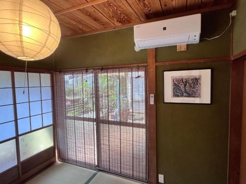 Televisyen dan/atau pusat hiburan di Vation rental PIGGY'S nichinan - Vacation STAY 21067v