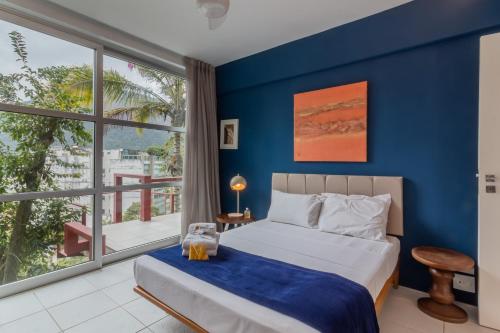 Ένα ή περισσότερα κρεβάτια σε δωμάτιο στο Casa com vista para a Lagoa Rodrigo de Freitas - VR2