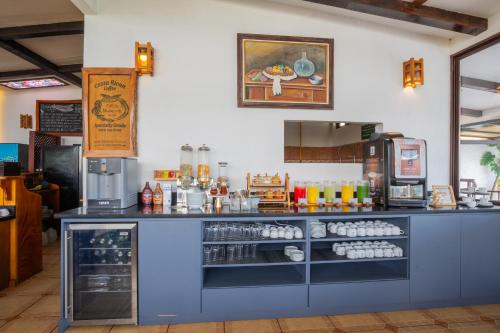 a counter in a coffee shop with a counter sidx sidx at Camino Verde B&B Monteverde Costa Rica in Monteverde Costa Rica